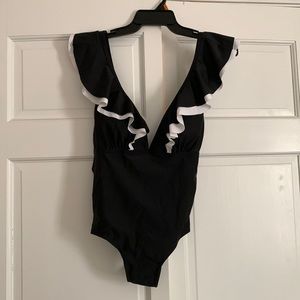 Black and white one piece womens swim. New with tags!
